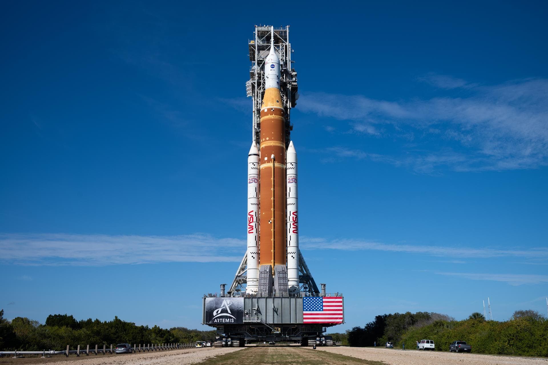 The SLS rocket carrying Artemis II rolling on the crawler.