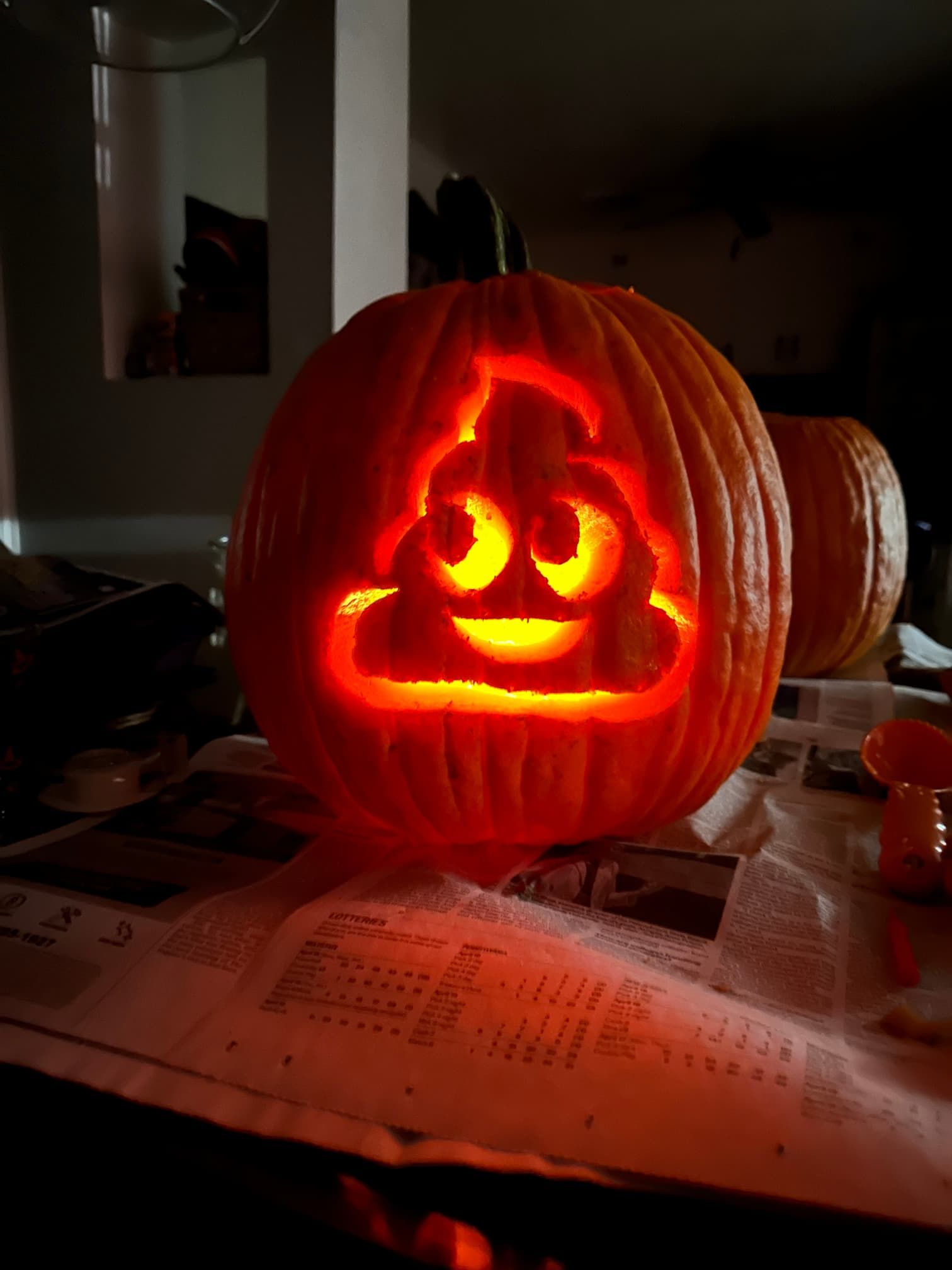 My pumpkin carved this year as the poop emoji