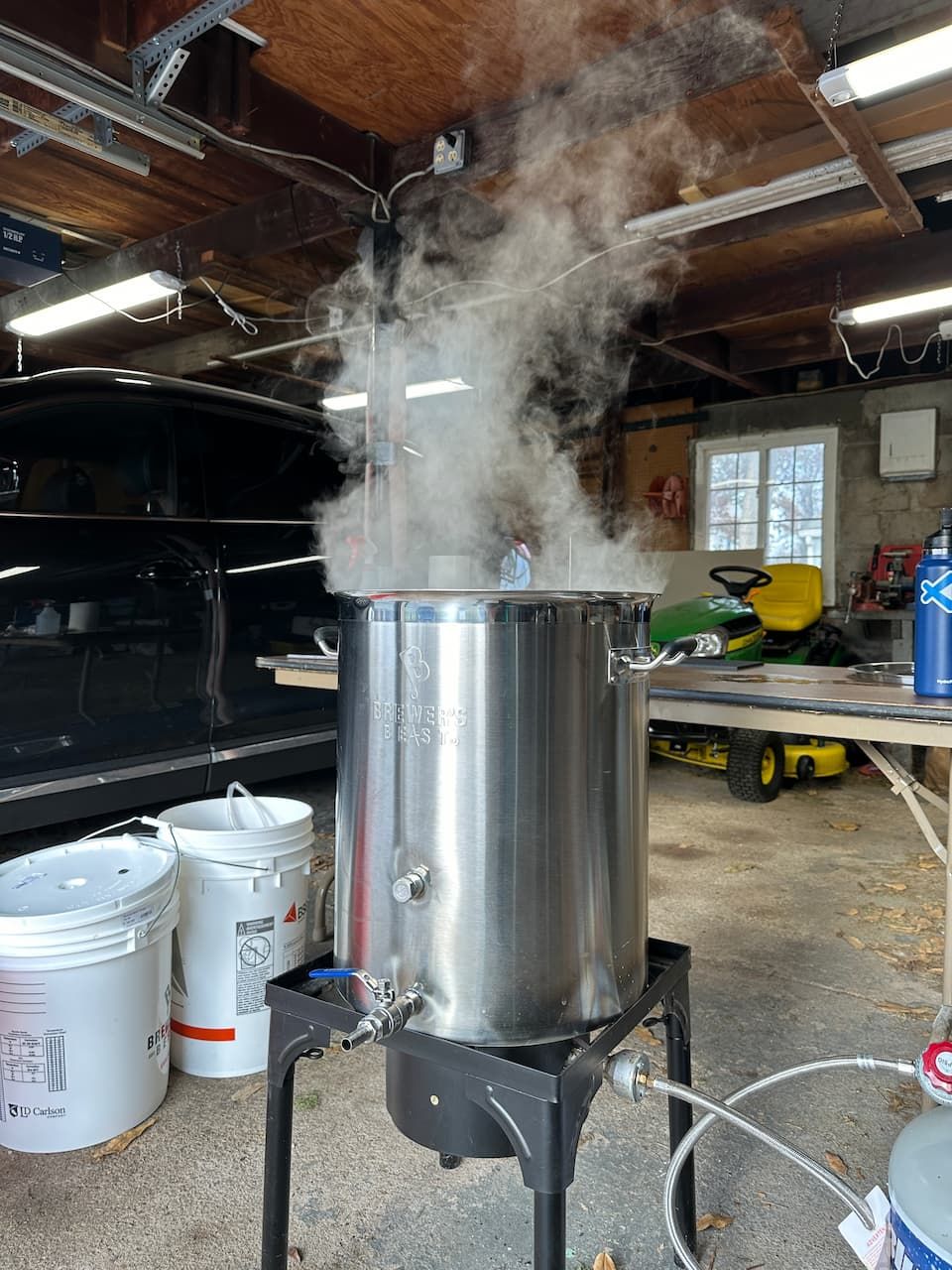 My large pot boiling the wort with steam coming up out of it