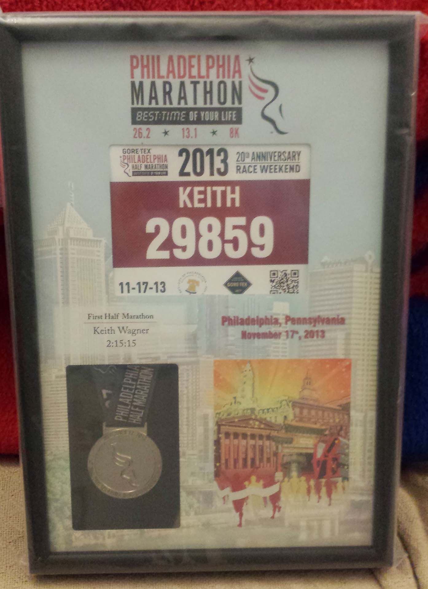 My half marathon bib and medal framed